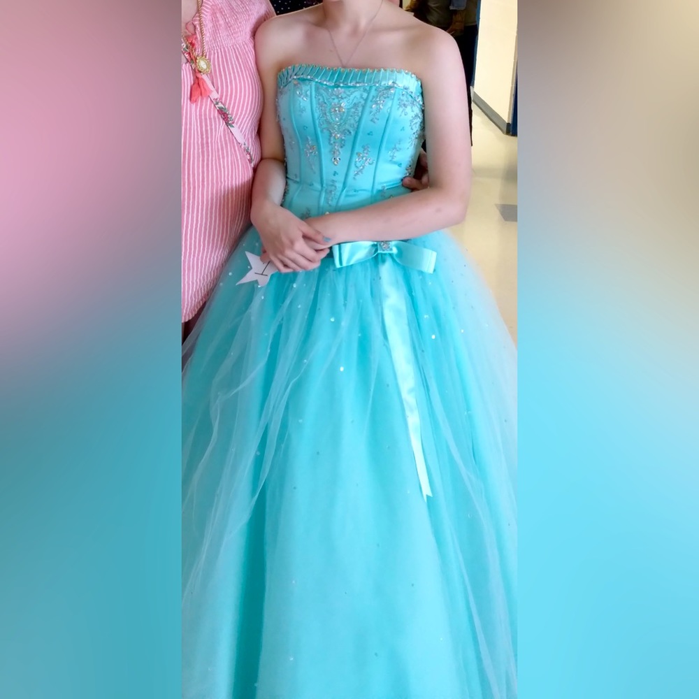 Pageant/Prom Dress. Light blue. Corset back. Fits a size  small.